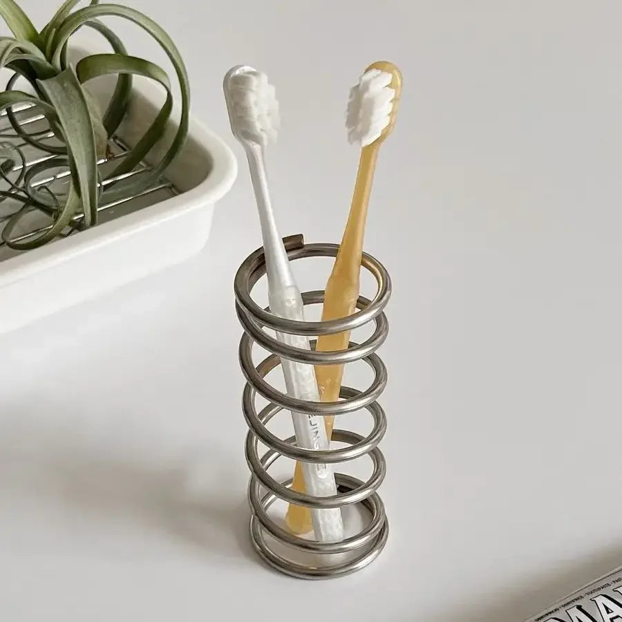 SPRING-SHAPED CYLINDRICAL TOOTHBRUSHES/PENCILS HOLDER