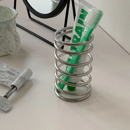 SPRING-SHAPED CYLINDRICAL TOOTHBRUSHES/PENCILS HOLDER